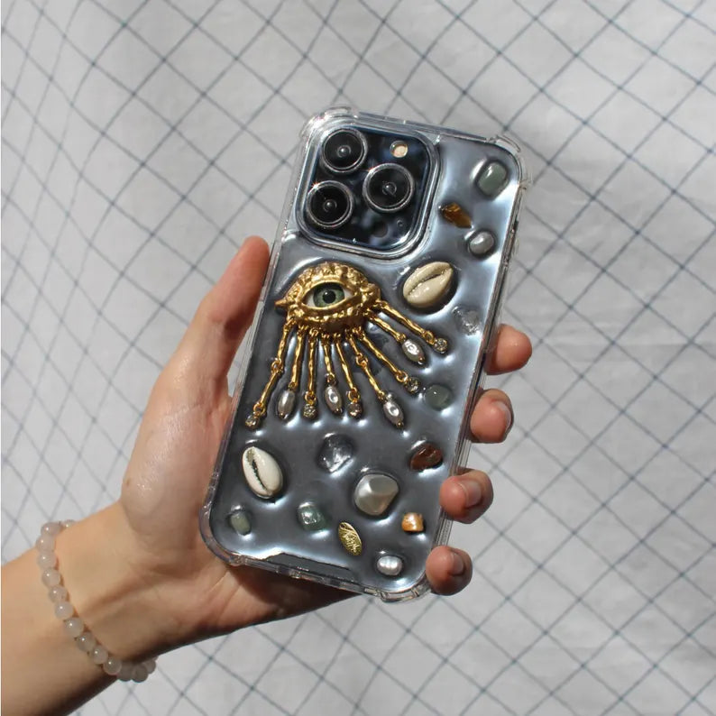 Resin designer Iphone case, aesthetic Iphone case for iPhone 16 15 14 13 12 11 pro max plus mini case, Golden eye with shells and stones